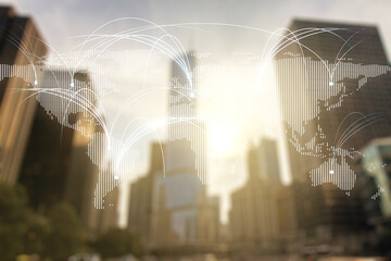 Double exposure of abstract digital world map hologram with connections on modern skyscrapers background, research and strategy concept