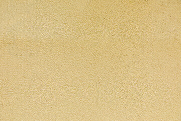 plastering a new modern house wall with plastic grid on a PVC insulation basis