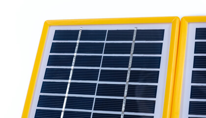 Portable solar panel isolated on white background. Small solar battery cell panel. Renewable and clean energy concept