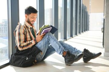 Handsome and young indian Male college student.