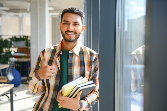 Happy Indian Male Student At The University