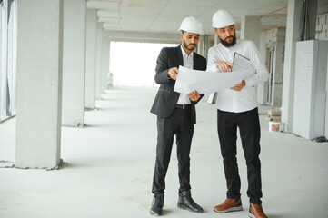 two multiracial business man construction site engineer