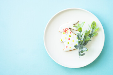 Easter food background. Easter table setting. Flat lay on blue.