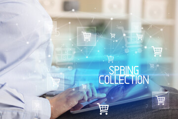 Young person makes a purchase through a tablet