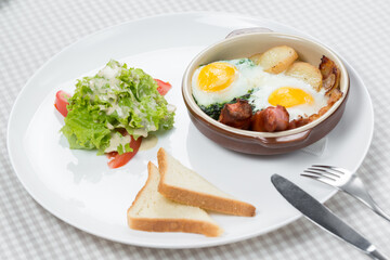 healthy breakfast, fried eggs in a pan