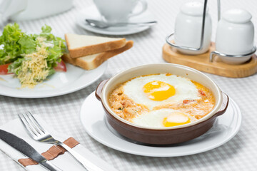 healthy breakfast, fried eggs in a pan