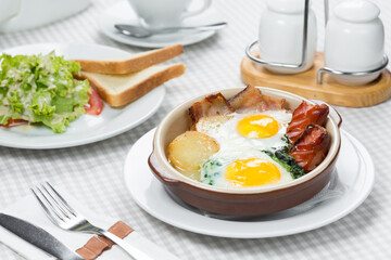 healthy breakfast, fried eggs in a pan