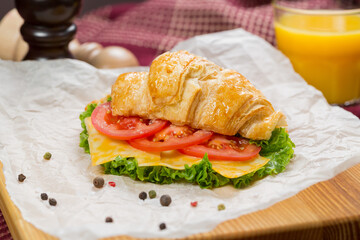 croissant with cheese and orange juice