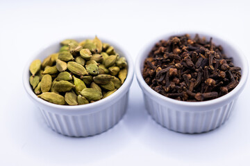 Cardamom, and Cloves in bowls