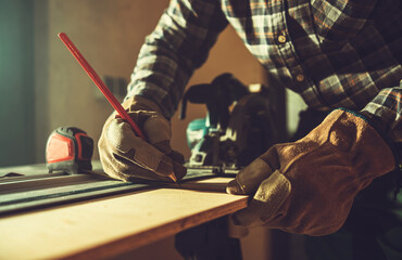 Construction Worker Working on His Woodwork Project