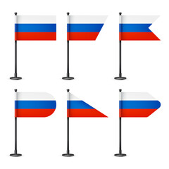 Realistic various Russian table flags on a black steel pole. Souvenir from Russia. Desk flag made of paper or fabric, shiny metal stand. Mockup for promotion and advertising. Vector illustration