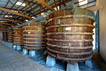factory fish sauce production facilities by traditional fermented method of anchovies fermented brewed in large in Phu Quoc island, Kien Giang province, Vietnam  