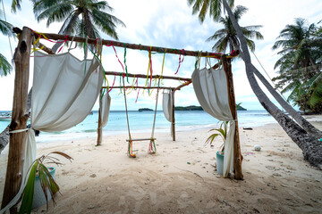 Swings and chairs on the beach at Phu Quoc Island, Vietnam