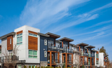 Fototapeta premium New residential townhouses. Modern apartment buildings in Canada. Modern complex of apartment buildings