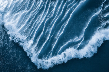 Fototapeta Spectacular aerial top view background photo of ocean sea water white wave splashing in the deep sea. Drone photo backdrop of sea wave in bird eye waves. obraz