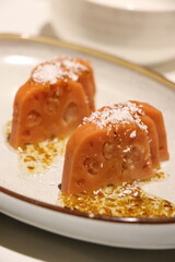 Sweet lotus root with rice on a plate