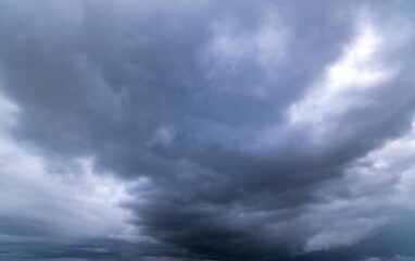 Obraz premium Dark sky with stormy clouds. Dramatic sky ,Dark clouds before a thunder-storm.