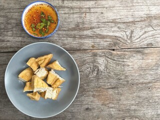 Tofu Chinese food on wood background