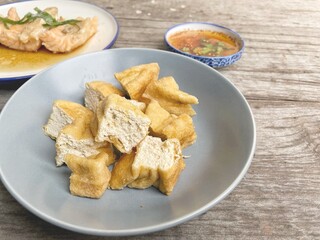 Tofu Chinese food on wood background