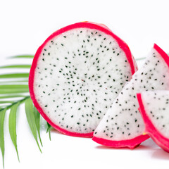 Natural dragon fruit and a slices, pitaya or pitahaya on white background.