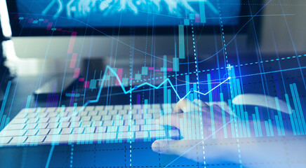 Golden bitcoins. Cryptocurrency on computer desk and Double Exposure chart