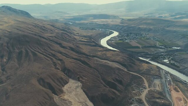 aerial view to Indus river and valley, Karakoram, Pakistan. Nice view of the valley, Sarayan village, agricultural fields in the mountainous landscape.