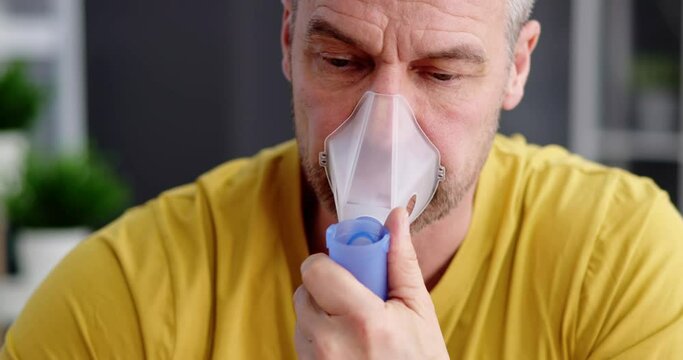 Asthma Patient Breathing Using Oxygen Mask