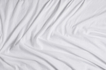 Crumpled white fabric as background, top view