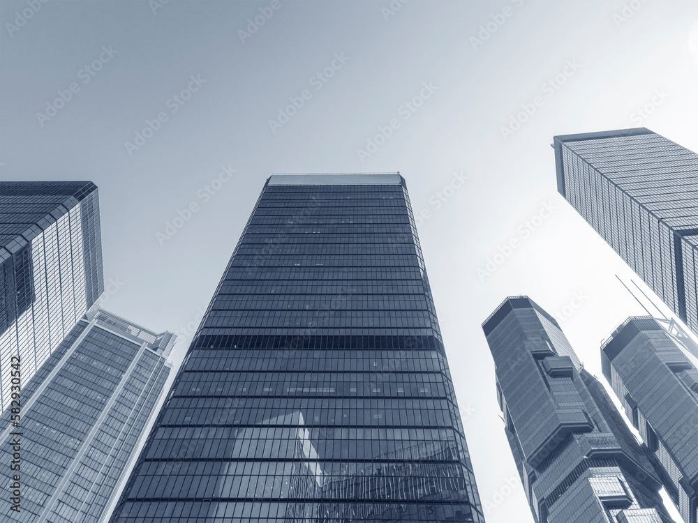 Poster exterior of modern office building in downtown district of hong kong city. architecture abstract bac