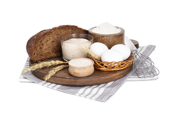 Freshly baked bread, sourdough, flour, eggs and spikes on white background