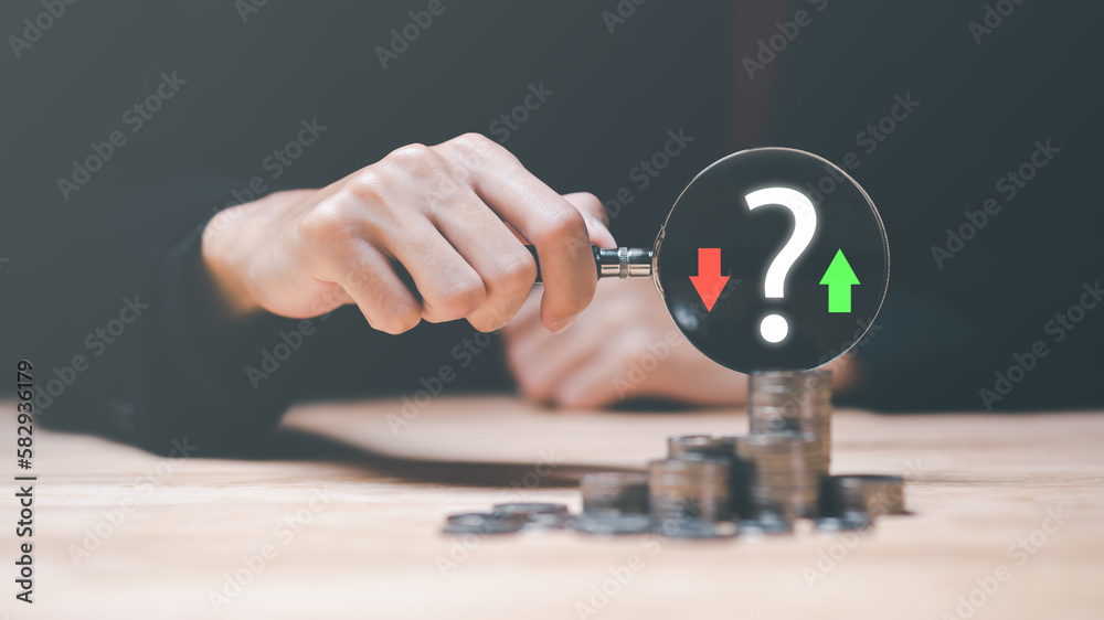Poster man holding a magnifying glass ,financial planning and investment ,analysis of company financial dat