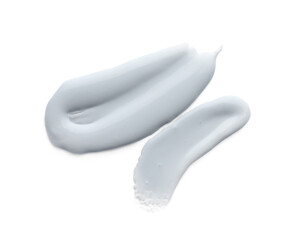 Sample of facial cream isolated on white, top view