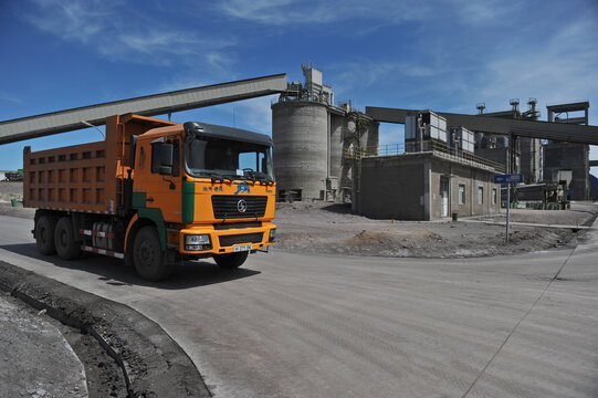 Zhambyl region, Kazakhstan - 05.15.2013 : KAMAZ trucks are moving to the sector of rock and cement dumping.