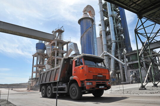 Zhambyl region, Kazakhstan - 05.15.2013 : KAMAZ trucks are moving to the sector of rock and cement dumping.
