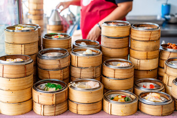 Traditional Chinese Dim Sum in bamboo basket at restaurant