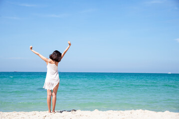 Lifestyle woman and relax chill on beach background. Travel summer vacations, copy space for banner.Summer vacations