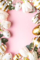 Easter golden eggs and white tulips on pink  background.