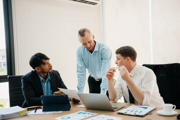Obraz premium Business people sum up the results of their work in the company during the year, new project in office.