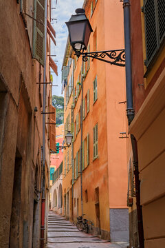 Narrow crooked street in the Old Town, Vieille Ville in Nice, French Riviera