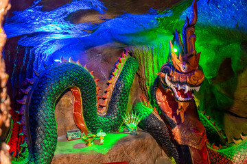 Obraz premium The serpent statue in the cave at Wat Don Khanak, Nakhon Pathom, Thailand