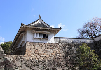 Medieval stone fortress wall and watch tower of Okayama castle (Ravens Castle, Black castle), Okayama, Japan