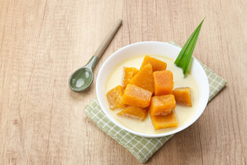 Kolak Waluh or Kolak Labu Kuning, Indonesian traditional food. Pumpkin in sweet coconut milk. Popular during ramadan
