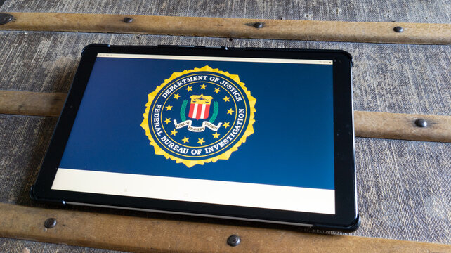 Fbi Logo Brand And Text Sign On Screen Tablet Computer Us Federal Bureau Of Investigation Department Of Justice