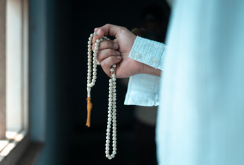 Young men with Rosary Beads, Muslim person Holding Tasbih 