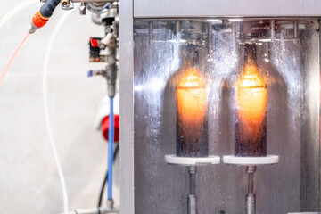 machine for washing and filling glass bottles with beer