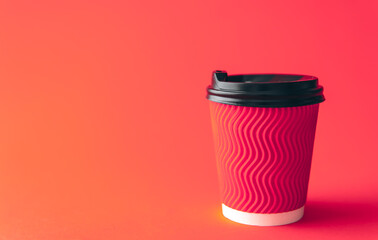 Disposable paper cup in trendy color Viva Magenta.