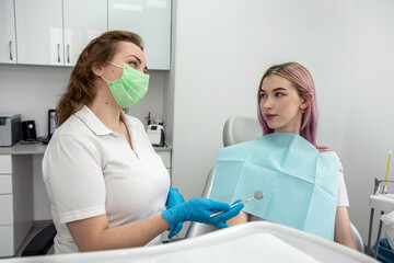 dentist who is interviewing patient's medical history asks for  patient before treatment.