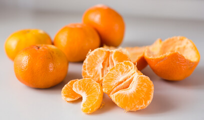 fresh tangerines on white background