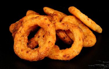 Group of crispy battered fried French onion rings