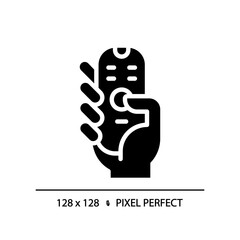 Hand with remote control pixel perfect black glyph icon. Digital device with keys. Contactless infrared gadget. Silhouette symbol on white space. Solid pictogram. Vector isolated illustration